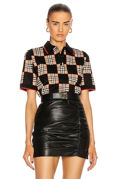 Shop Burberry Jennifer Polo Top In Black & Archive Beige