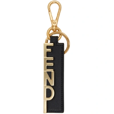 Shop Fendi Black And Gold Logo Charm Keychain In F0rng Blkgd