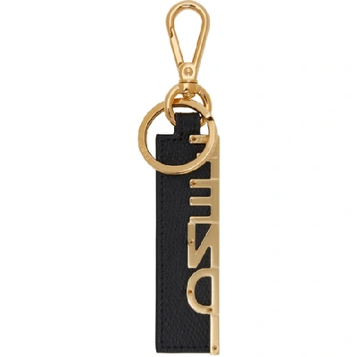 Shop Fendi Black And Gold Logo Charm Keychain In F0rng Blkgd