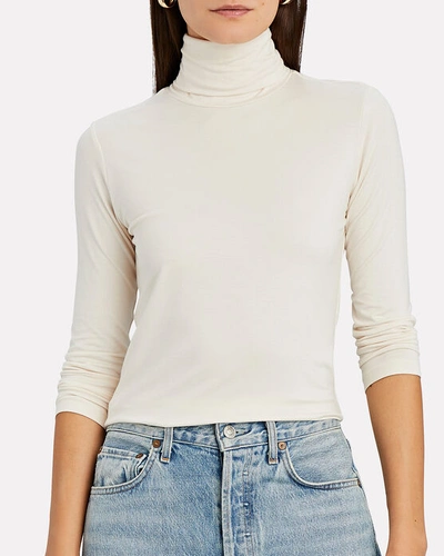 Shop L Agence Aja Jersey Turtleneck Top In Ivory