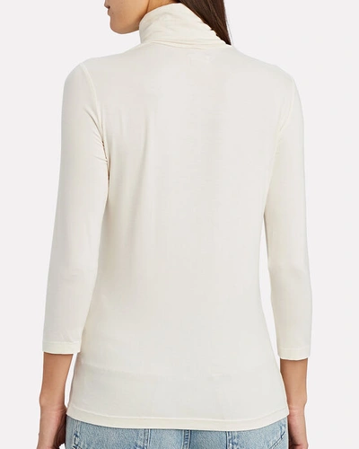 Shop L Agence Aja Jersey Turtleneck Top In Ivory