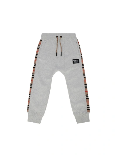 Shop Burberry Kids Sweatpants In White