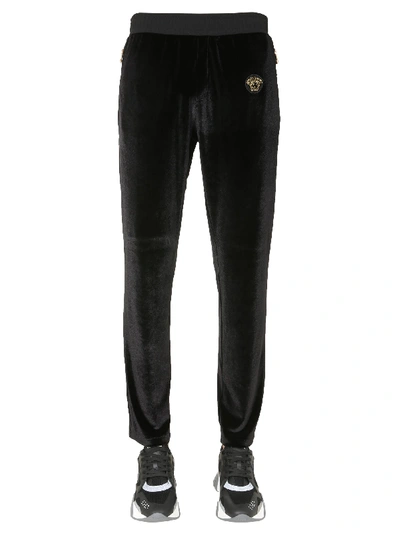 Shop Versace Taylored Fit Trousers In Nero