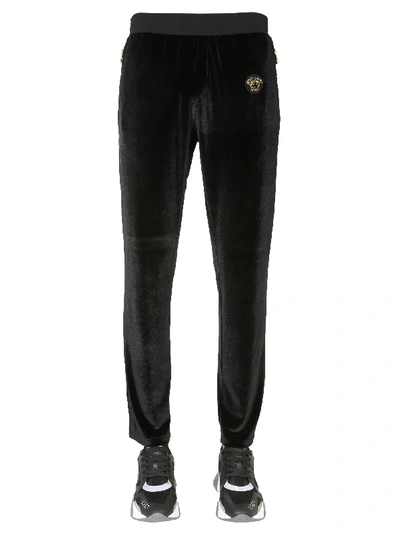 Shop Versace Taylored Fit Trousers In Black