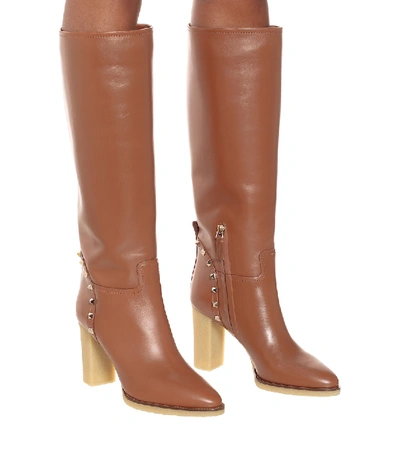 Shop Valentino Rockstud Leather Knee-high Boots In Brown