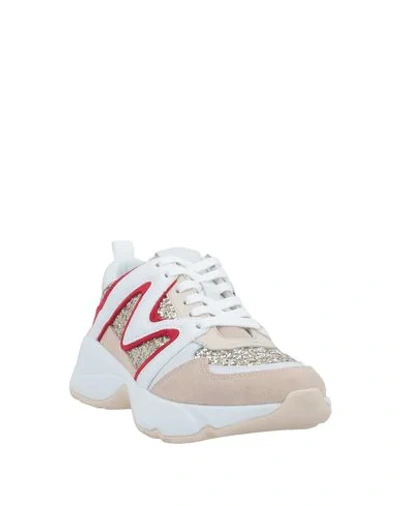 Shop Maje Sneakers In White
