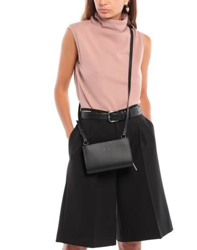 Shop Pb 0110 Cross-body Bags In Black