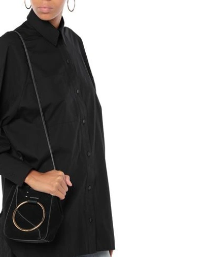 Shop Atp Atelier Cross-body Bags In Black