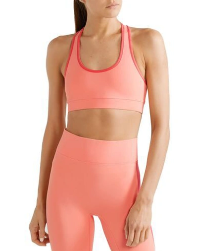 Shop All Access Tops In Salmon Pink