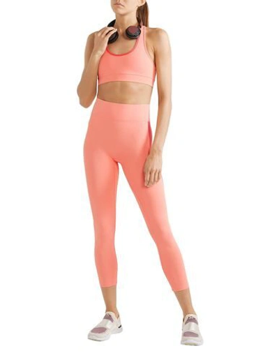 Shop All Access Tops In Salmon Pink