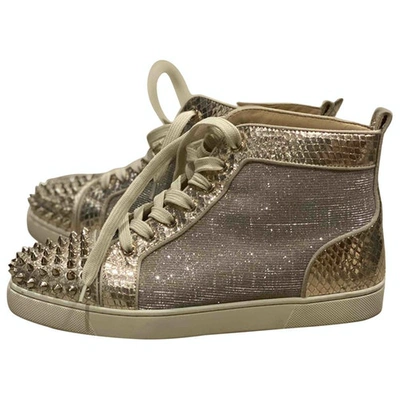Christian Louboutin Lou Spikes Gold Glitter Sneaker ($635) ❤ liked on  Polyvore featuring shoes, s…