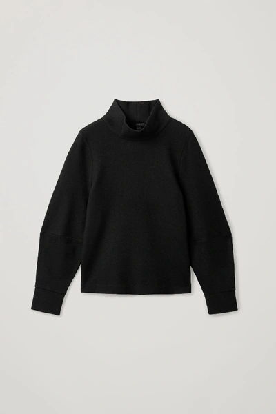 Shop Cos Turtleneck Knitted Jumper In Black
