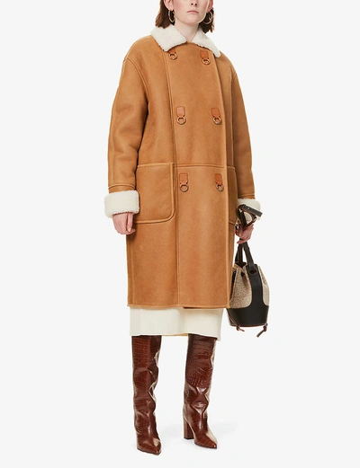 Shop Loewe Contrast-collar Leather And Shearling Coat