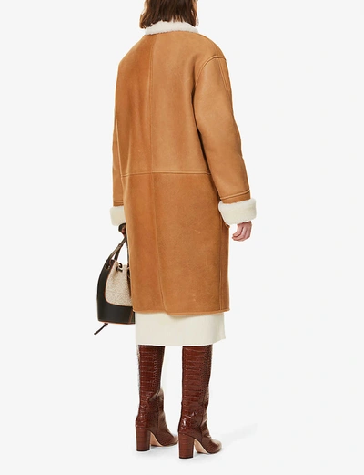Shop Loewe Contrast-collar Leather And Shearling Coat