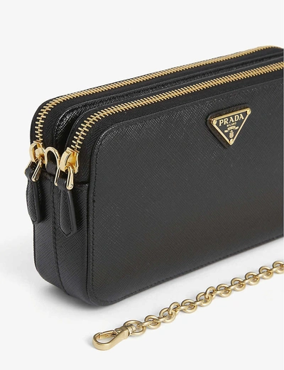 Shop Prada Logo-appliqué Leather Cross-body Bag In Nero