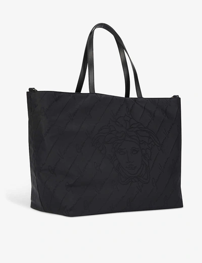 Shop Versace Logo-print Reversible Woven Changing Bag Tote In Black