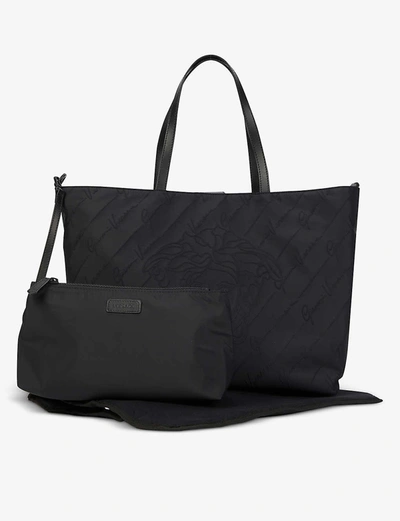 Shop Versace Logo-print Reversible Woven Changing Bag Tote In Black