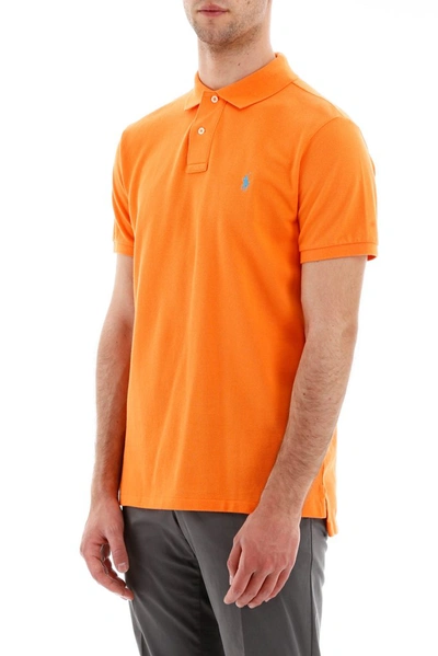 Shop Polo Ralph Lauren Logo Embroidered Polo Shirt In Orange