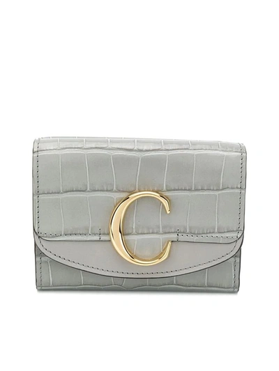 Shop Chloé C Plaque Embossed Wallet In Grey