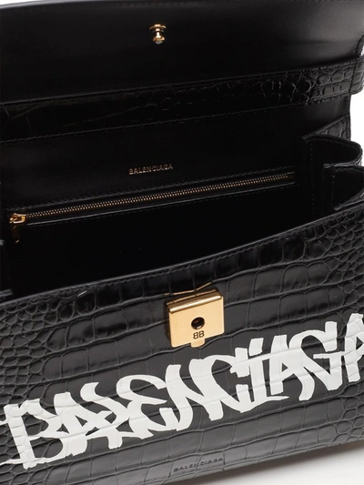 Shop Balenciaga Ghost Medium Graffiti Logo Shoulder Bag In Black