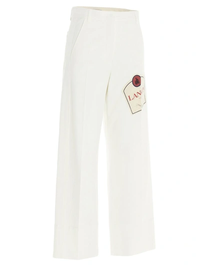 Shop Lanvin Logo Patch Jeans In White