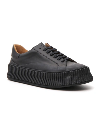 Shop Jil Sander Low Top Lace Up Sneakers In Black