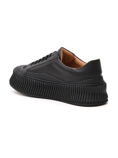 Shop Jil Sander Low Top Lace Up Sneakers In Black