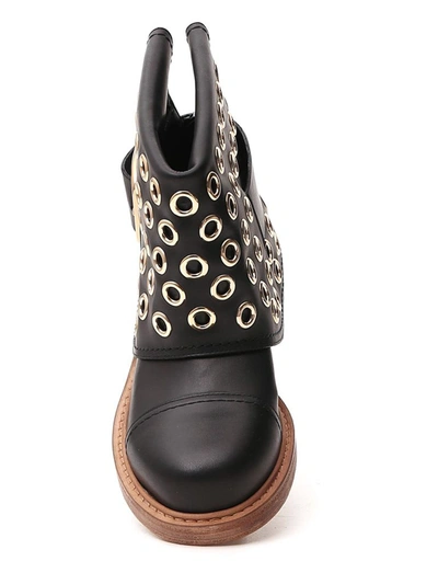 Shop Alexander Mcqueen Cuff Eyelet Boots In Black