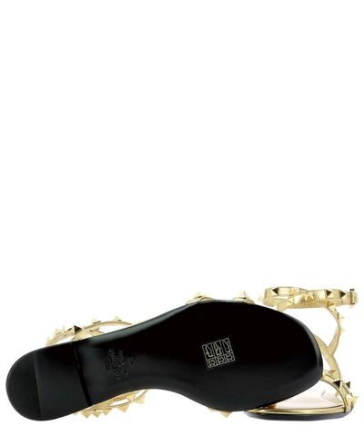 Shop Valentino Garavani Rockstud Sandals In Gold