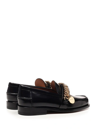 Shop Givenchy Chain Embellished Loafers In Black