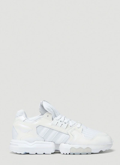 Shop Adidas Originals Zx Torsion Sneakers In White