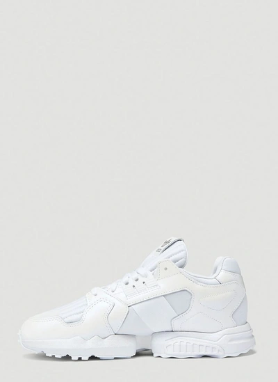 Shop Adidas Originals Zx Torsion Sneakers In White