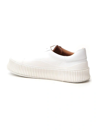 Shop Jil Sander Low Top Lace Up Sneakers In White