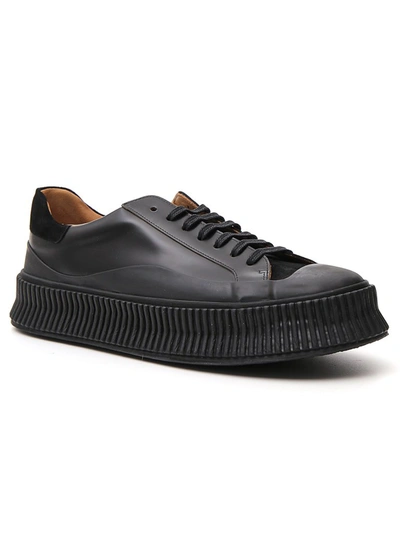 Shop Jil Sander Lace Up Low Top Sneakers In Black