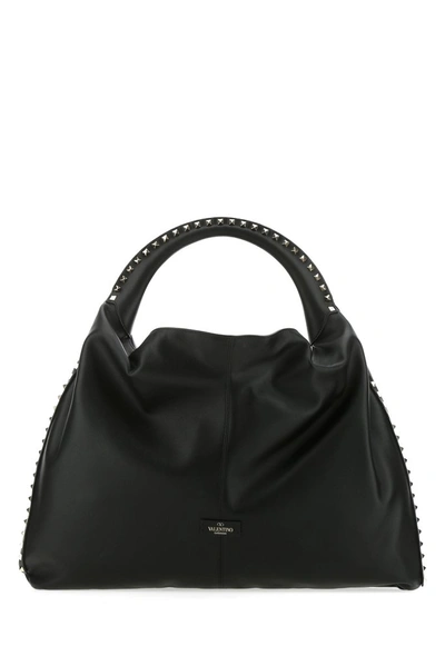 Shop Valentino Garavani Rockstud Hobo Shoulder Bag In Black