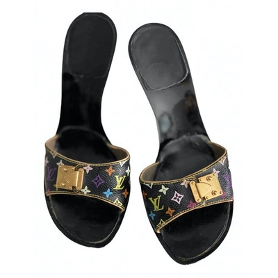 Pre-owned Louis Vuitton Cloth Mules & Clogs In Black