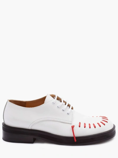 Shop Jw Anderson Stitch Detail Derby Shoes In White