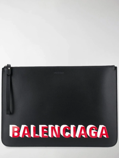 Shop Balenciaga Logo Print Clutch Bag In Black