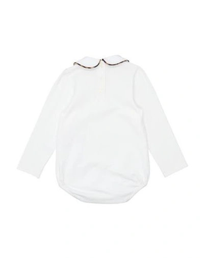 Shop Dolce & Gabbana Bodysuits In White