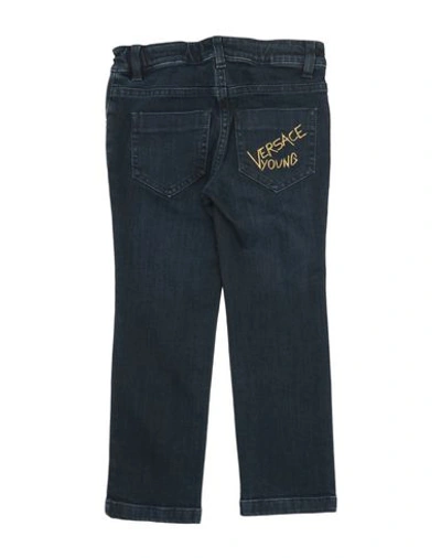 Shop Versace Young Denim Pants In Blue