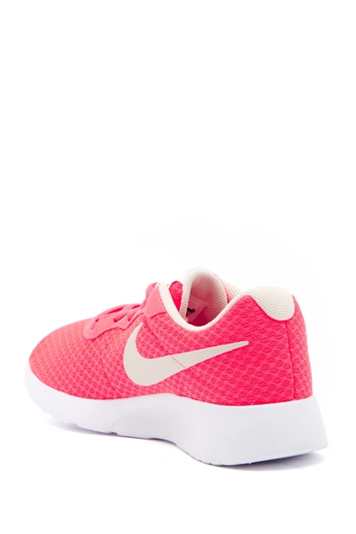Shop Nike Tanjun Sneaker In Solrrd/ltowbr