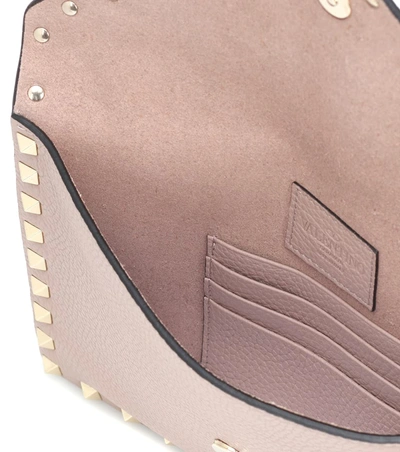 Shop Valentino Rockstud Small Leather Pouch In Pink
