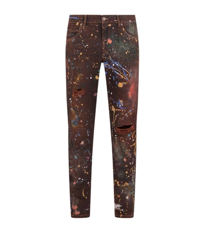 Shop Dolce & Gabbana Paint-splattered Slim Jeans