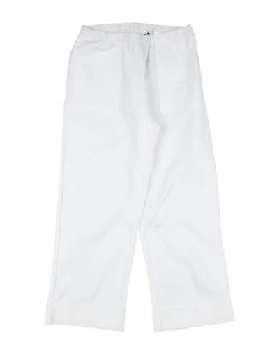 Shop Touriste Pants In White
