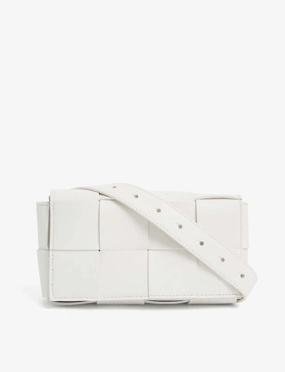 Shop Bottega Veneta Cassette Intrecciato Leather Belt Bag In White Gold