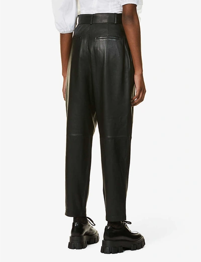 Shop Red Valentino High-rise Tapered Leather Trousers In Nero