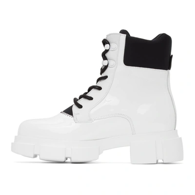 Shop Joshua Sanders White Patent Velar Boots In White/black