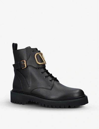 Shop Valentino Logo-plaque Leather Ankle Boots In Black
