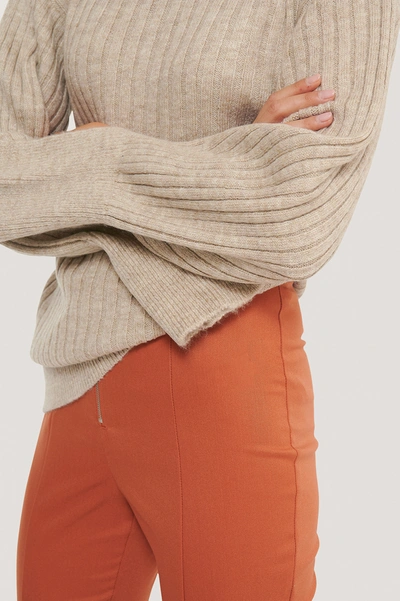 Shop Gine Margarethe X Na-kd Cuff Slit Knitted Sweater - Beige In Light Beige