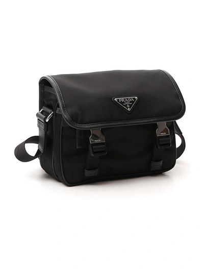 Shop Prada Logo Saffiano Shoulder Bag In Black